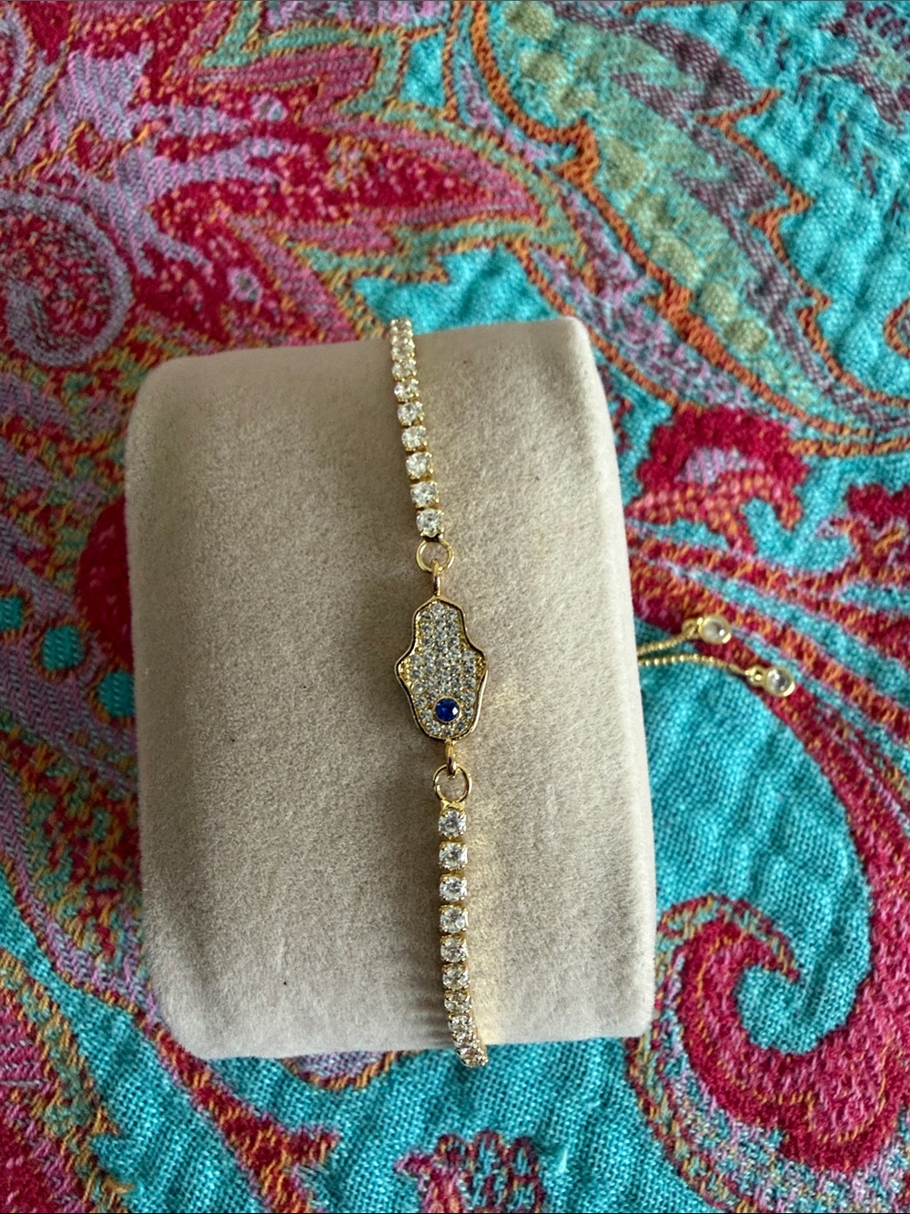 Gold Hamsa Tennis Bracelet with Clear Crystals and Blue Accent